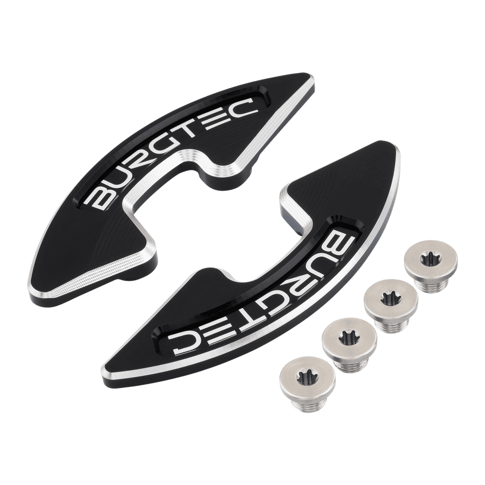 Burgtec chainring bash guard for mountain biking with metallic bolts, designed for durability and protection on rugged terrains.