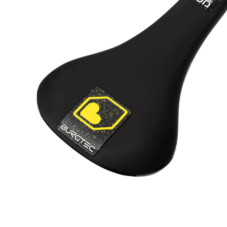 Burgtec The Cloud DH downhill mountain bike saddle featuring a sleek black design with yellow branding.