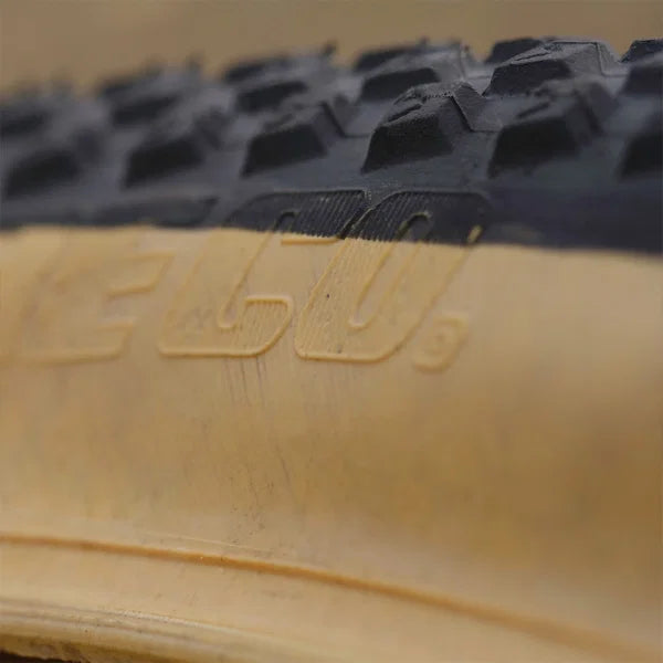 DMR DJ24 dirt jump tyres close-up showing tread design and skinwall features