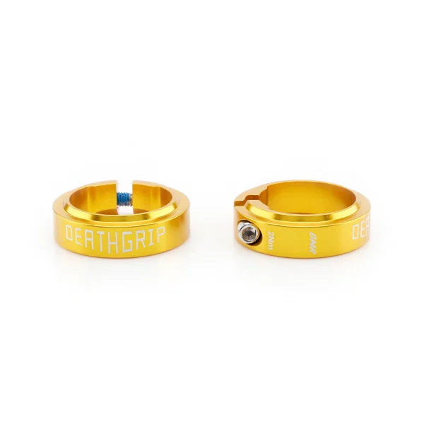 aluminium anodised grip collars for DMR Deathgrip2 in gold color, showcasing the slimline design and custom fit.