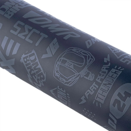 DMR BMX Jump Bike Frame Pad featuring iconic logos, durable PVC, and velcro fastening for secure fit on BMX bike frame pad.