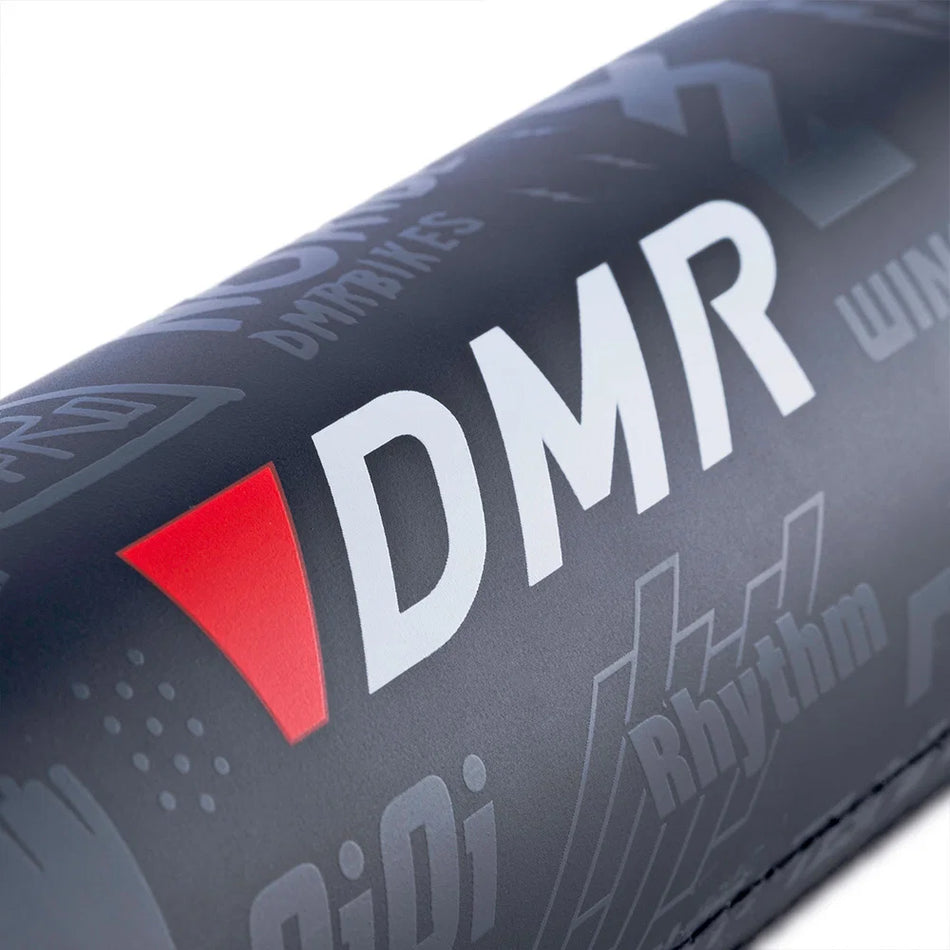 DMR BMX bike frame pad with logos and icons, designed for durability and lightweight protection.
