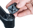 Person using Park Tool FCT-1 suspension fork cap removal tool to remove a fork cap.