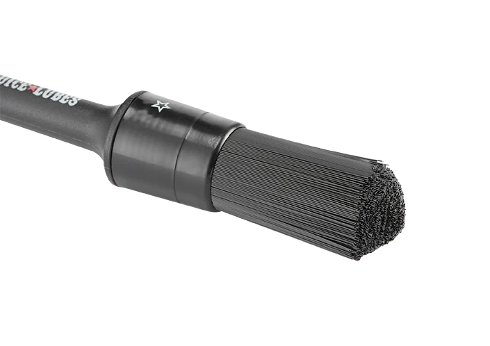 Close-up of Juice Lubes Stiffler Drivetrain Brush, ideal for drivetrain cleaning brush for bikes.