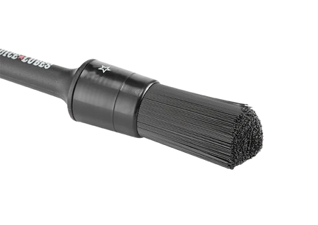 Close-up of Juice Lubes Stiffler Drivetrain Brush, ideal for drivetrain cleaning brush for bikes.