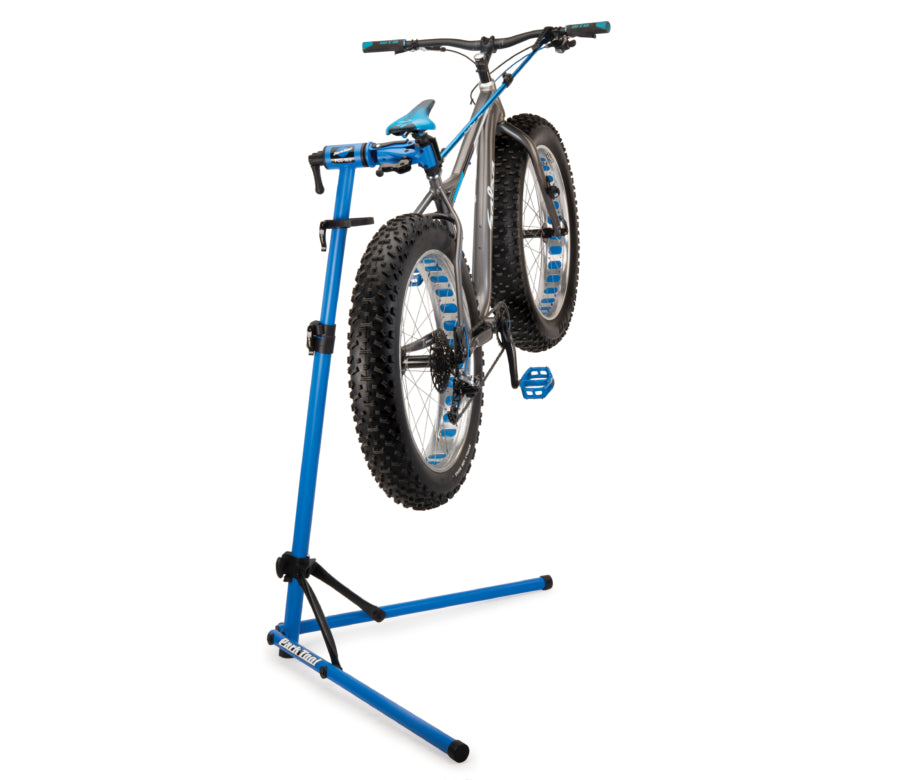 Park Tool PCS-10.3 deluxe home mechanic bike stand holding a fat bike for easy repairs and adjustments.