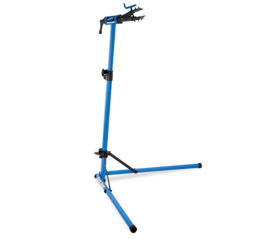 Park Tool PCS-9.3 home mechanic bike repair stand with adjustable height and 360-degree clamp rotation.