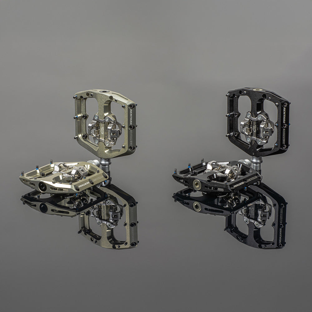 Renthal Revo-DHC Clip large platform MTB clip pedals in gold and black with reflections.