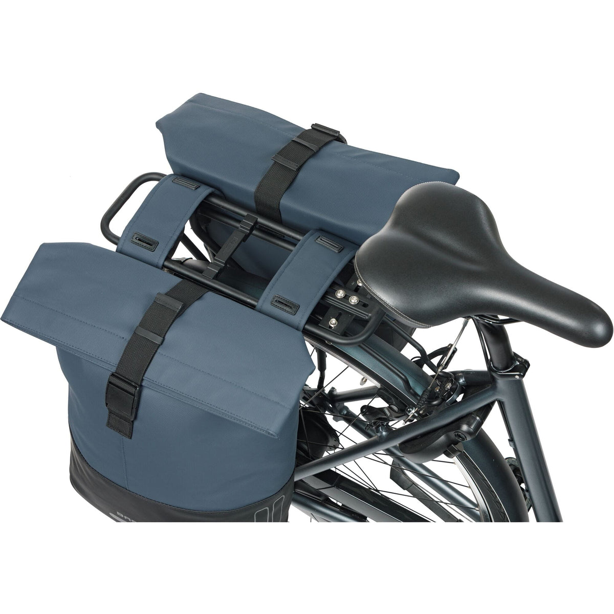 Basil Cove double pannier bag 28-32L in navy black on a bicycle, perfect for daily use and commuting.