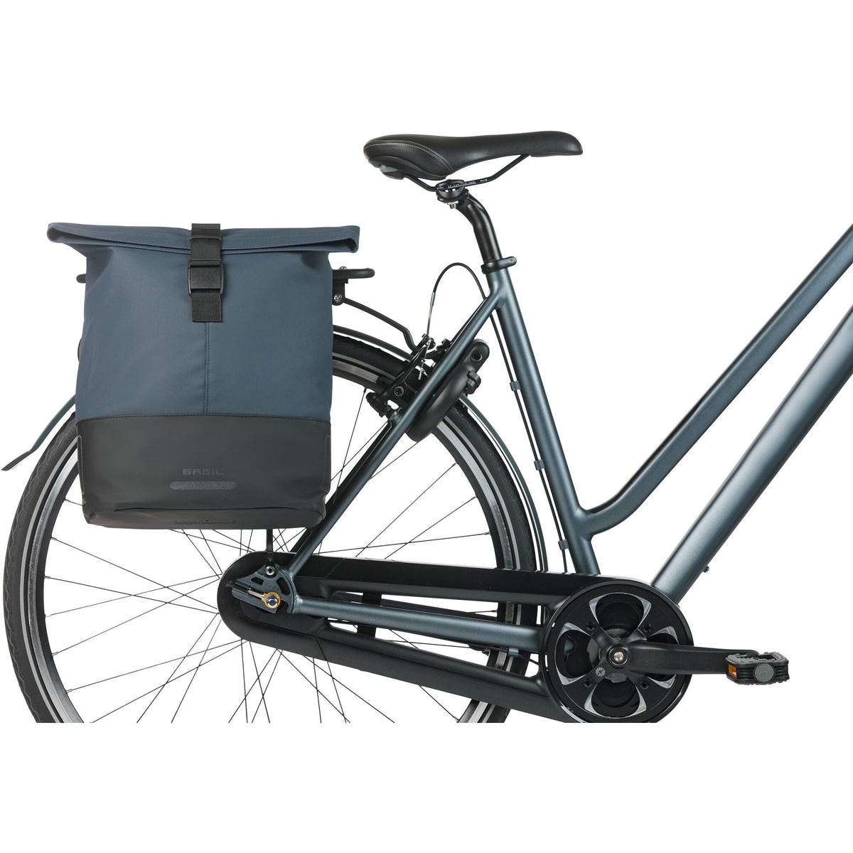 Basil Cove double pannier bag in navy black attached to a bike, perfect for daily commuting and stylish rides.