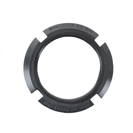 Campagnolo lock ring for power meter spider, featuring a black design with 'LOCK 40 Nm' marked on it.