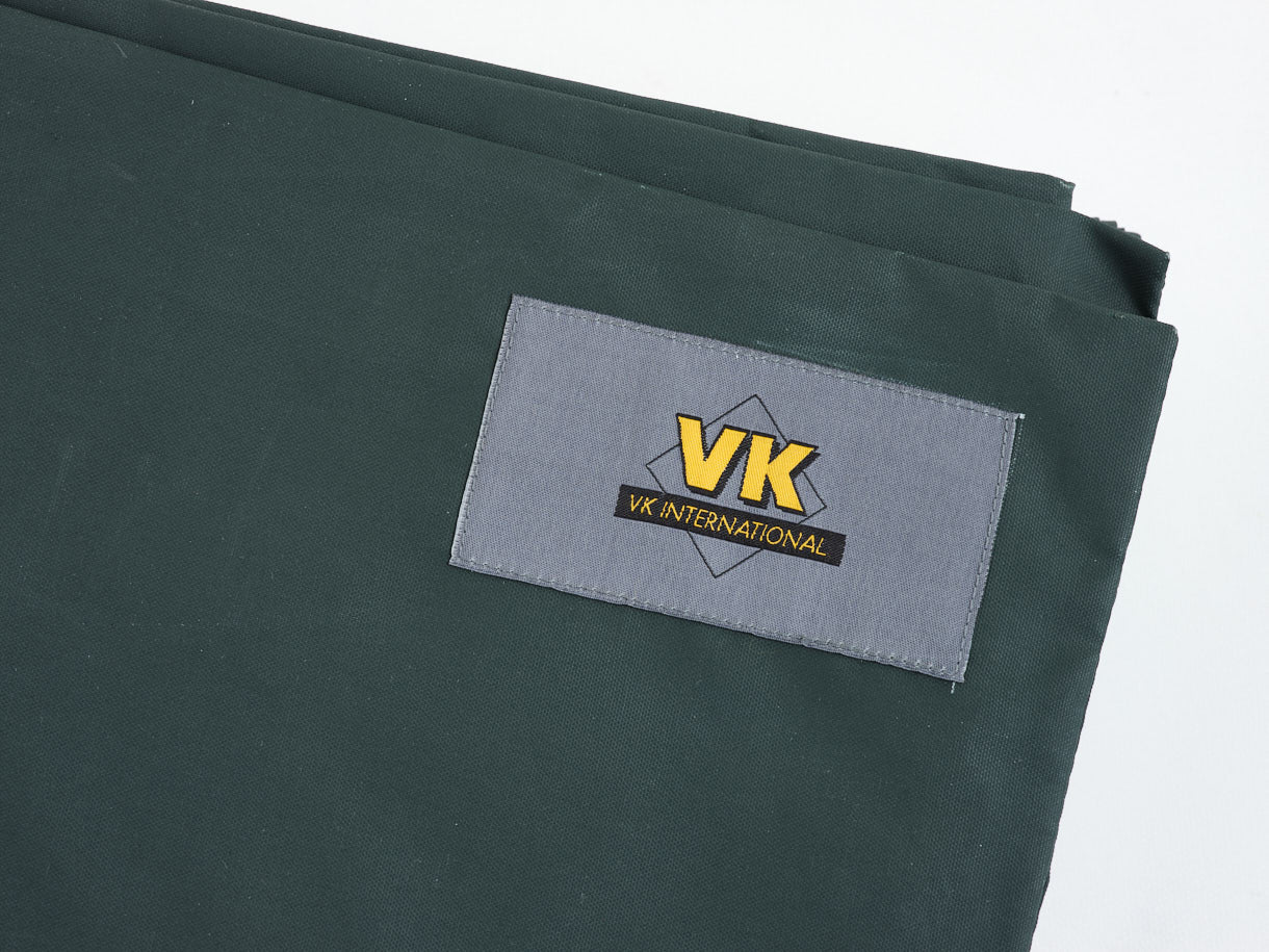 VK International waterproof bicycle cover forest green fabric with logo detail.