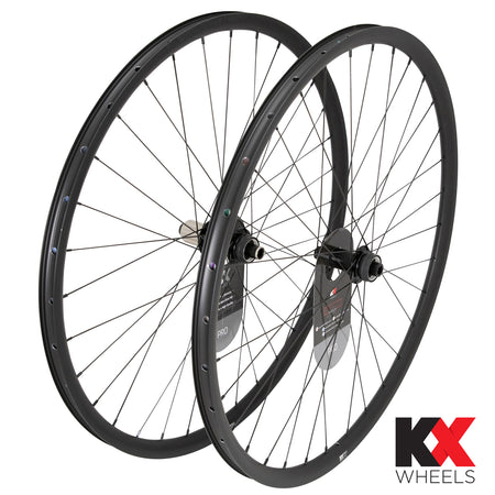 KX Pro 700c gravel disc brake wheels showcasing black tubeless thru axle design.