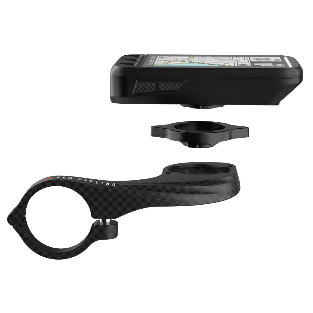 KOM QT01 Garmin to Wahoo adaptor showing Garmin GPS unit and adapter for easy compatibility.