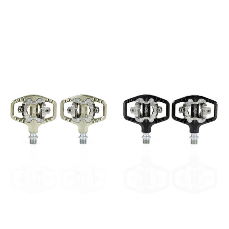 SPD compatible clip pedals for MTB in silver and black with a lightweight design.