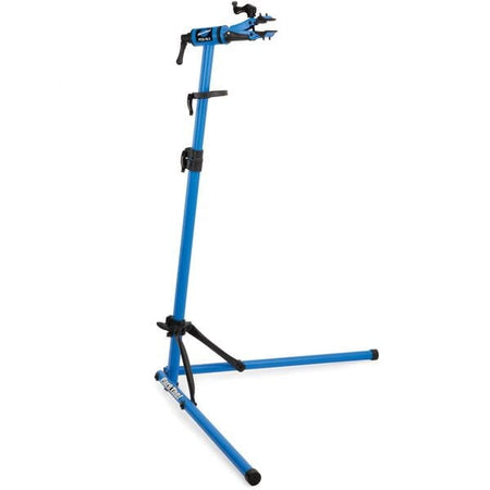 Park Tool PCS-10.3 deluxe home mechanic bike stand with adjustable height and clamp for easy bike repairs.