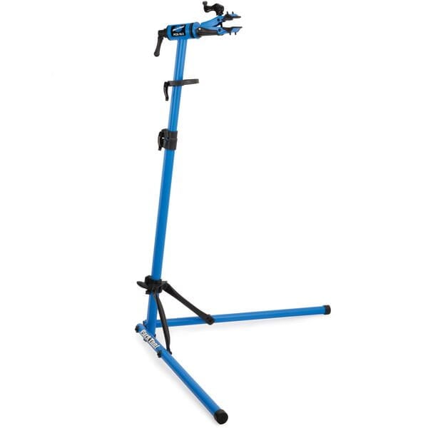 Park Tool PCS-10.3 deluxe home mechanic bike stand with adjustable height and clamp for easy bike repairs.