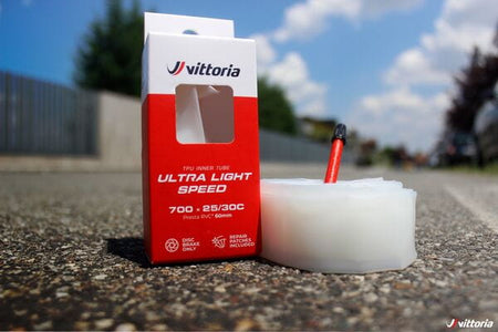 Vittoria ultra light road inner tube packaged in a box, showcasing the 700x25-30c 80mm Presta valve design.