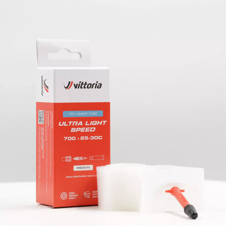 Vittoria ultra light speed inner tube with packaging showcasing Presta valve design and TPU material.